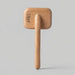 Wooden hook with a square wooden block on a gray background