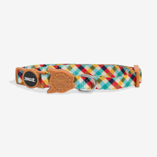 Colorful plaid cat collar with brown leather accents on a white background
