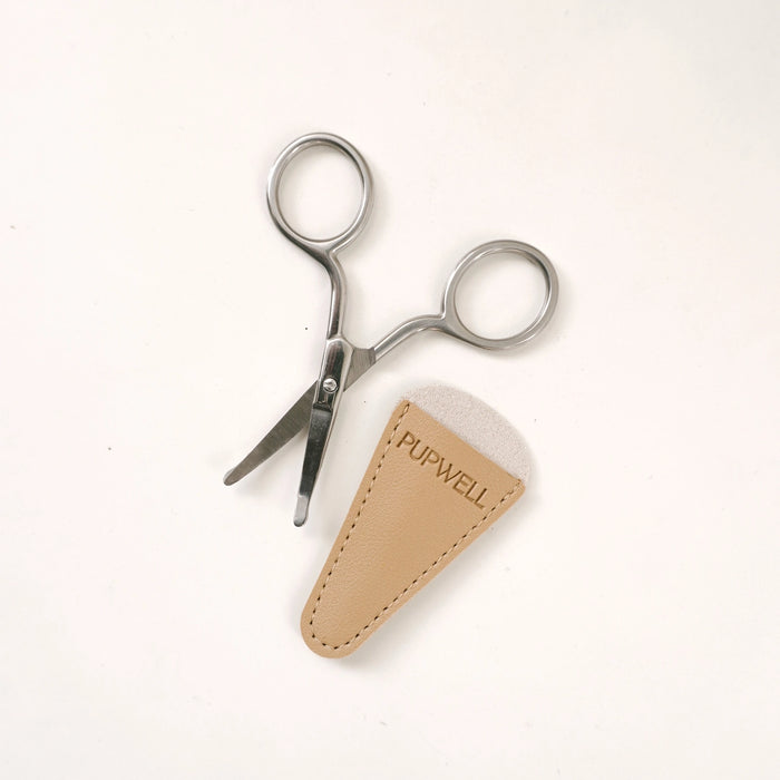 Pupwell nail clippers with silver metal blades and handles, shown next to a beige leather pouch with the brand name 'PUPWELL' on a white background.