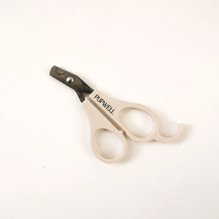 Pupwell nail clippers with beige ergonomic handles and dark metal blades, shown on a plain white background.