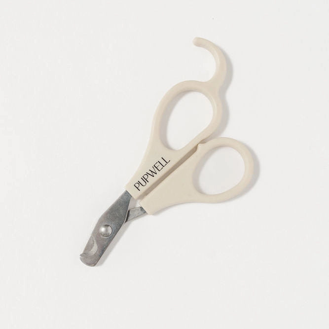Pet nail clippers with 'PUPWELL' branding on a white background