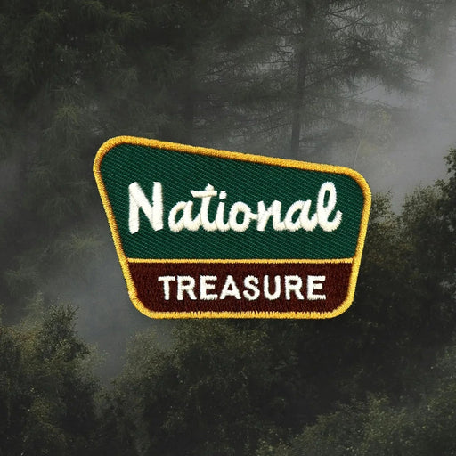 Patch with 'National Treasure' text on a forest background