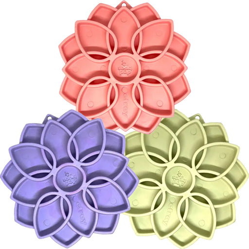 Set of three floral silicone molds in pink, purple, and green on a white background