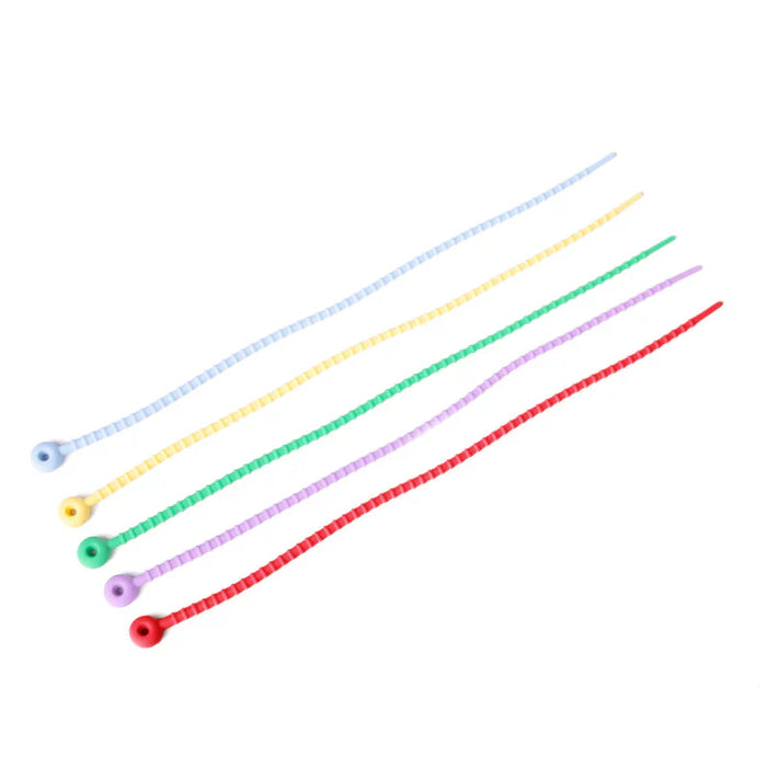 Set of colorful tie-wrap bands on a white background