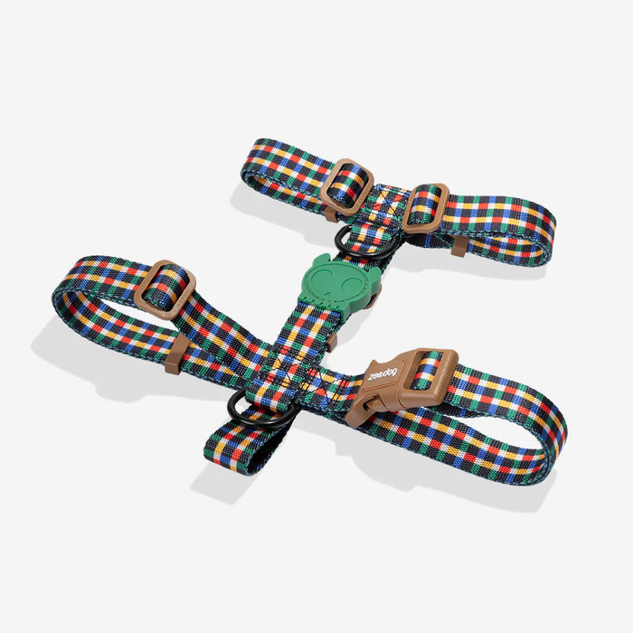 Colorful plaid dog collar and leash set on a white background