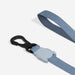 Light blue lanyard with a black carabiner on a white background