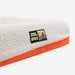 White boucle pet bed on a white background