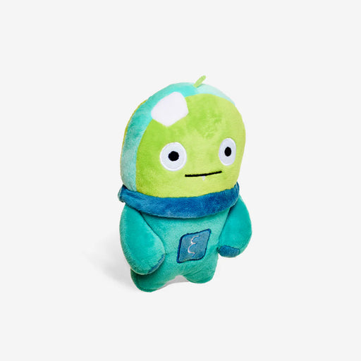 Green and blue plush toy on a light grey background