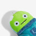 Plush toy with a green face and blue body on a white background