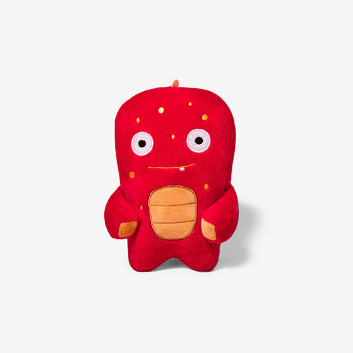 Red plush toy with a smiling face on a white background