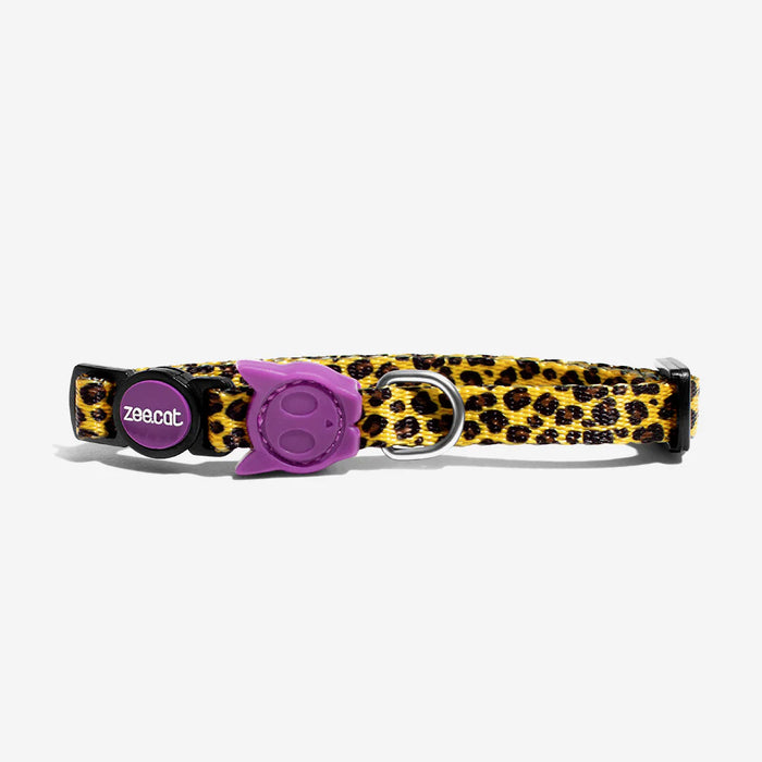 Leopard print cat collar with purple accents on a white background