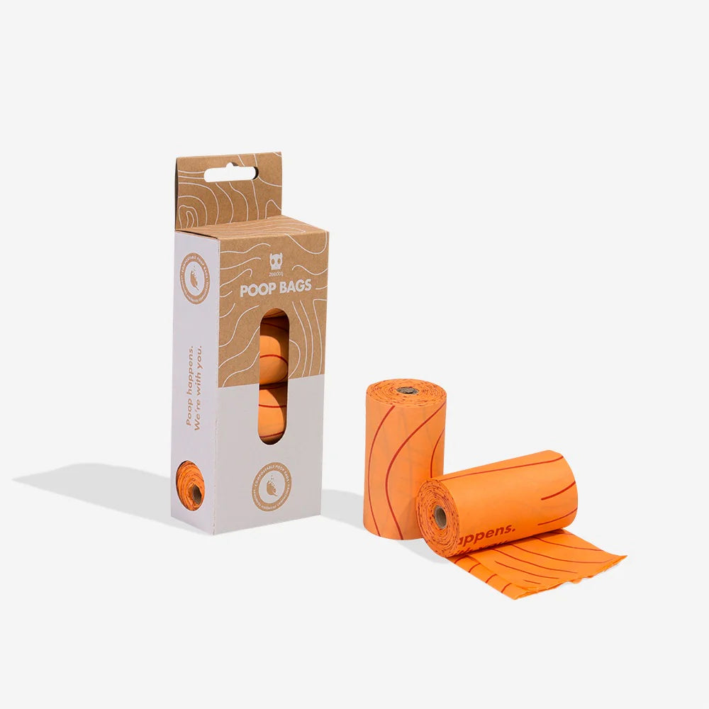 rolls of poo bags and packaging