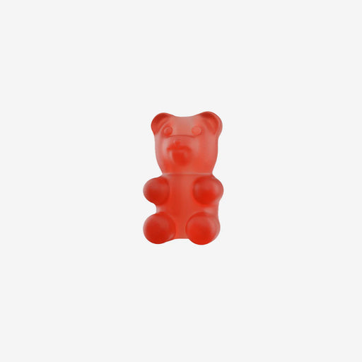 red gummy bear rubber pinz on a white background