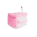Pink plush toy shaped like a cake with a candle on a white background