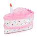 Plush toy shaped like a birthday cake with pink icing, white base, and colorful sprinkles on a white background.