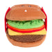 Plush toy shaped like a hamburger with layers of brown, green, red, and yellow on a white background.