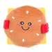 Plush toy shaped like a hamburger with a smiling face on a white background