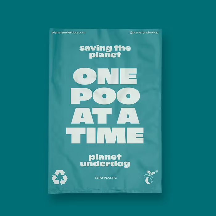 The image features a single green Planet Underdog poo bag, reading "Saving the planet, One poo at a time"