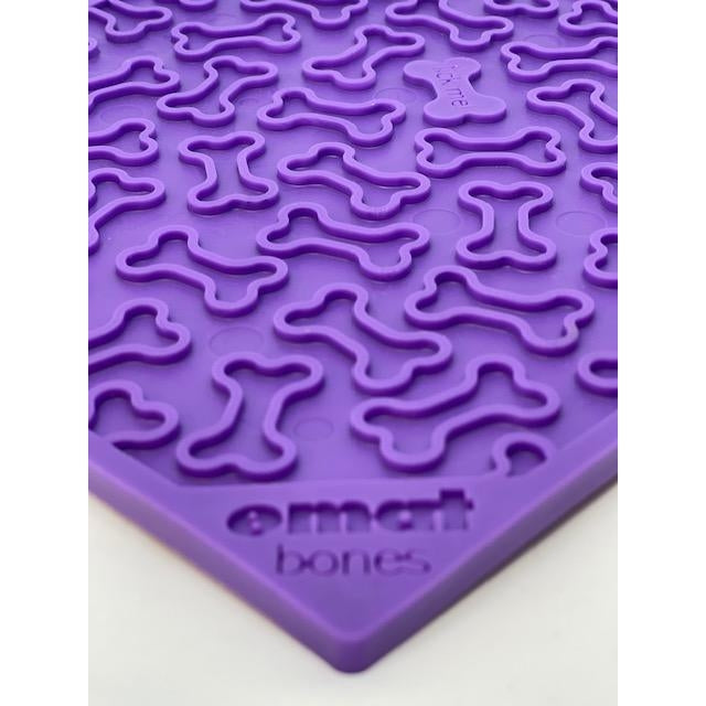 Close-up of the purple bone patterned licking mat by Sodapup