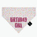 Pink sprinkle motif bandana with the words "Birthday girl" in dark pink.