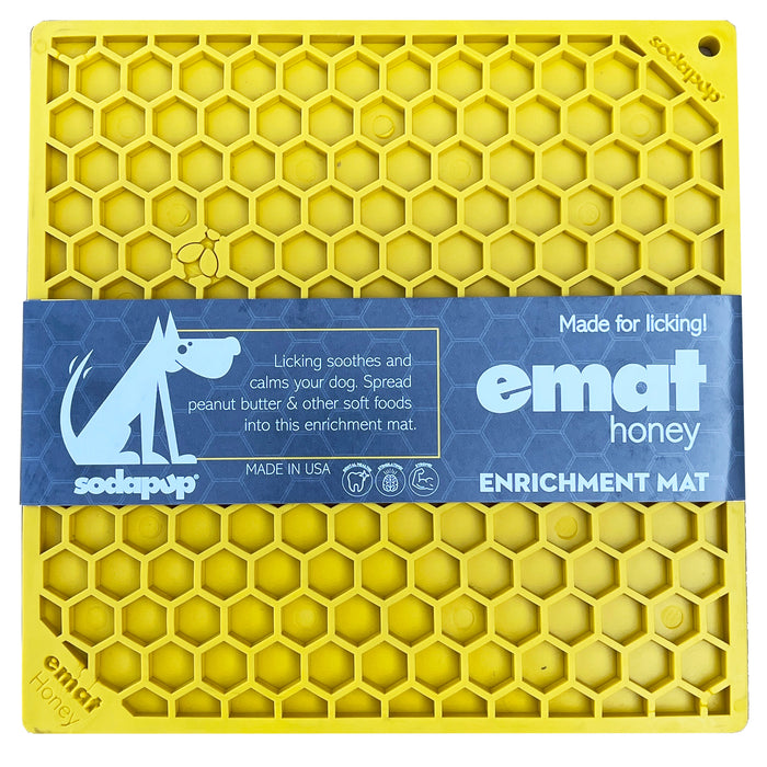 Yellow Honeycomb patterned licking mat by Sodapup with blue label