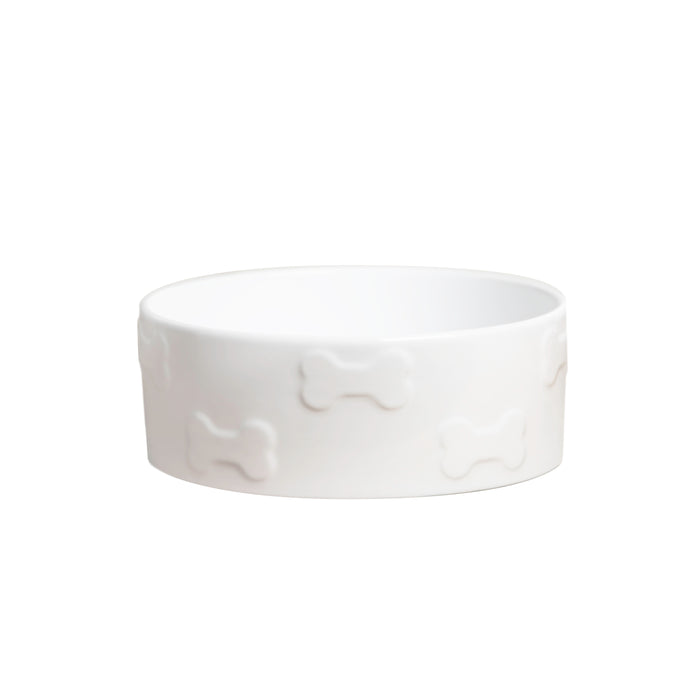 The Manor White Dog Bowl on a white backdrop. The bowl features a pattern of bones