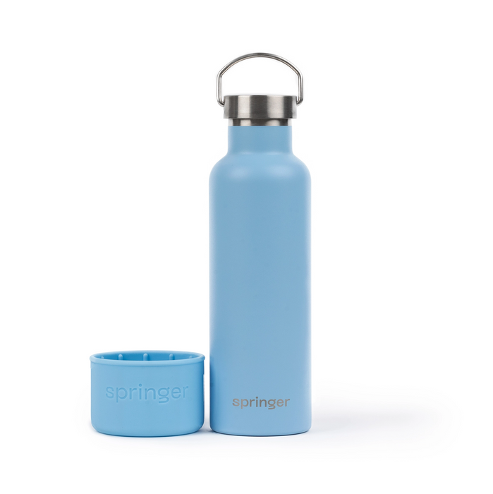 Sky Blue "Dog & Me" Reusable Insulated Bottle on a white background. The bottle features a silicone cup that can be used as a dog water bowl and has a brushed chrome top with handle.