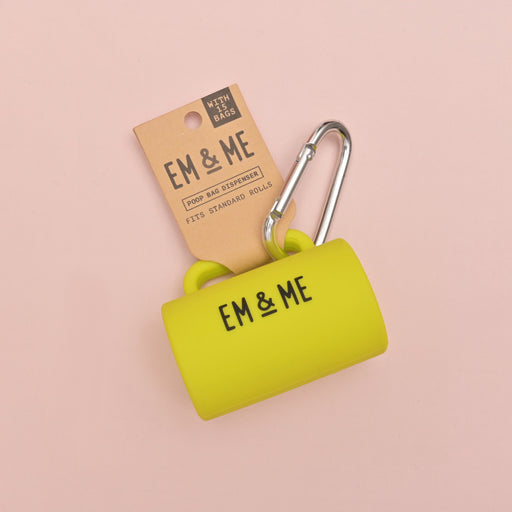 Em and me studio tennis ball yellow poop bag holder.