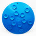 Back of blue silicone lick mat with suction cups intended for use with dogs.