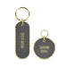 Howligans Keychain set in grey enamel and gold details. The set consists of a dog tag and keychains stating: "Dog Mom" and "Show Dog". The set is pictured on a white background.